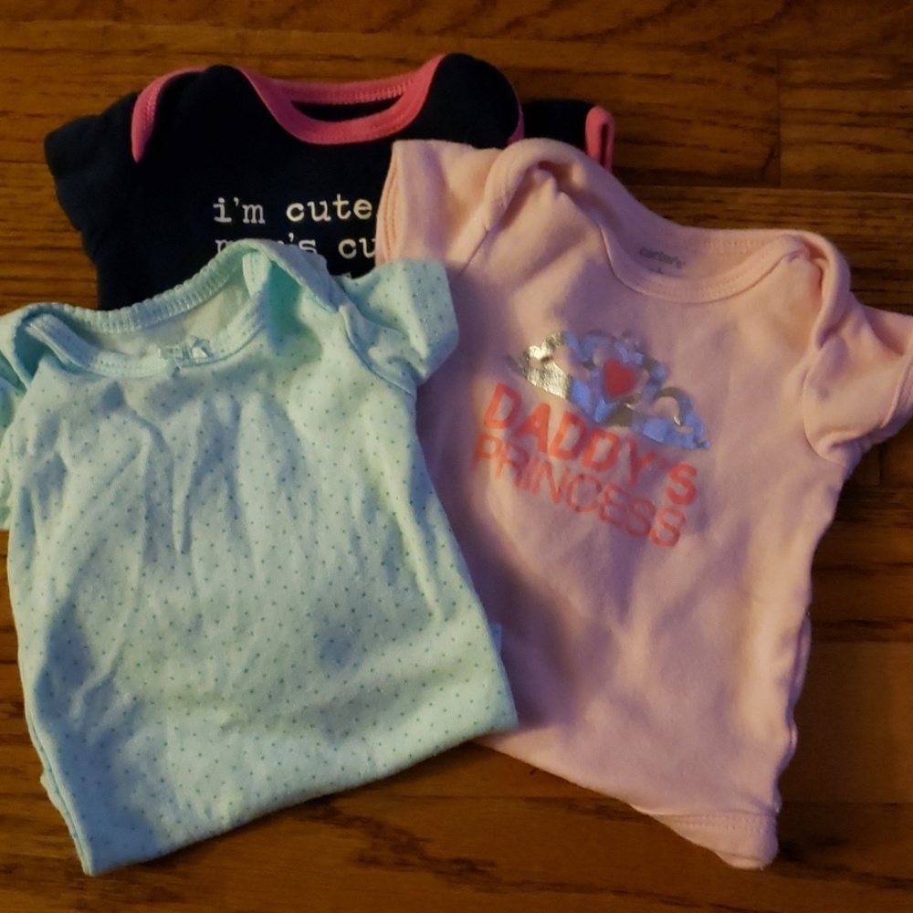 Gently used newborn onesies
